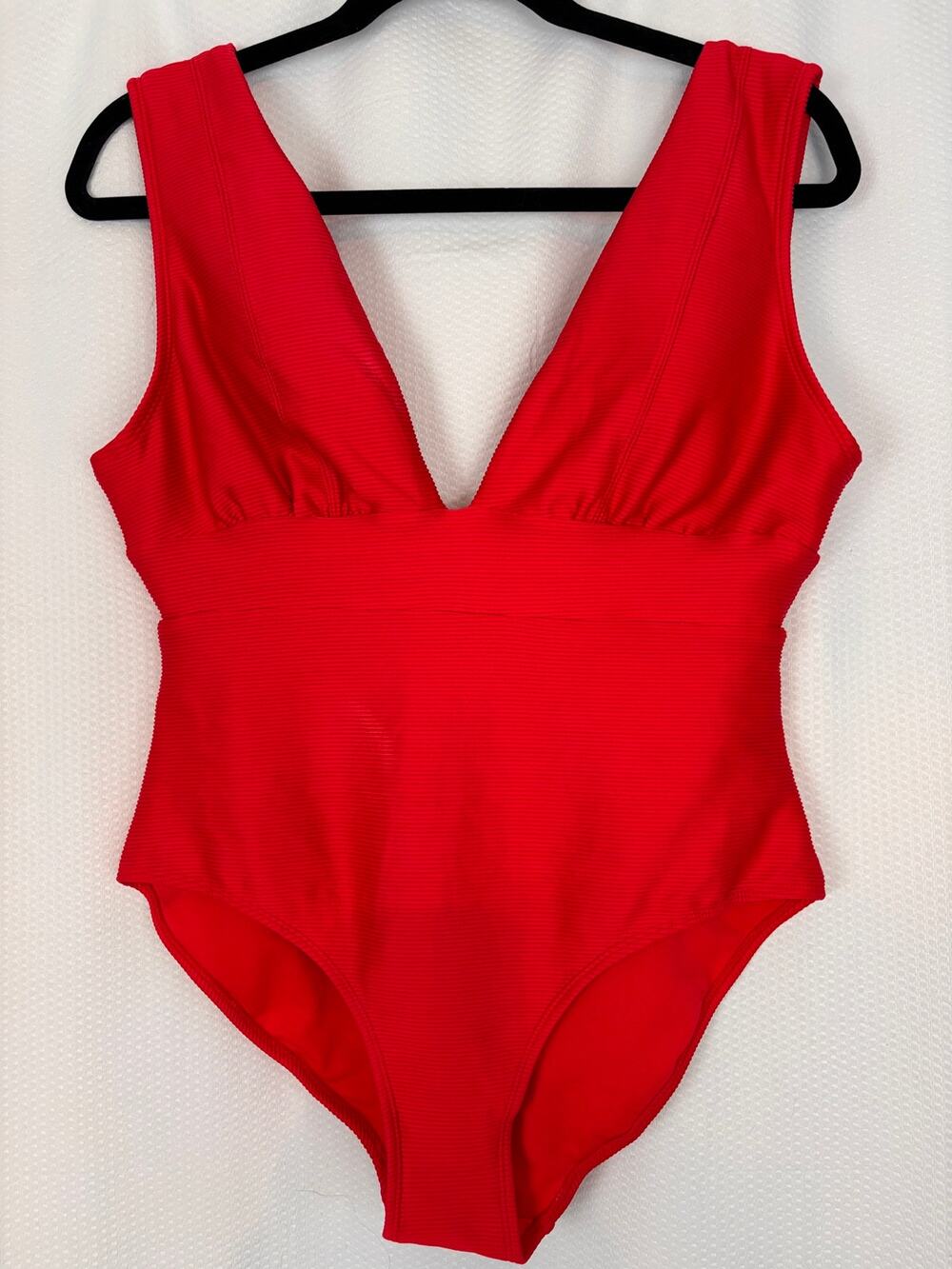 Heal one piece swimsuit with plunging neck line size medium